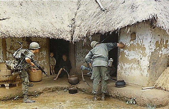 U.S. soldiers searching a village for potential Viet Cong