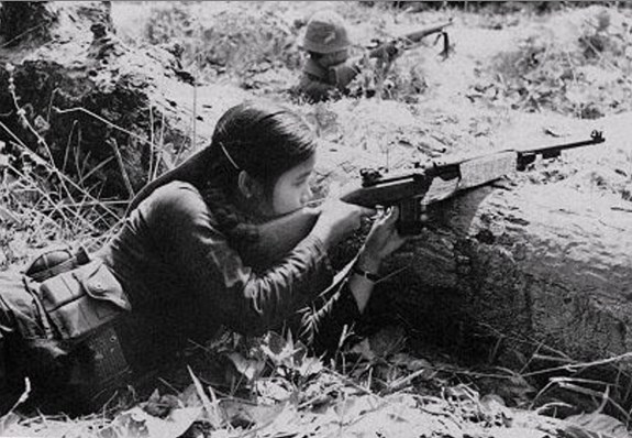 Female Viet Cong guerrilla in combat