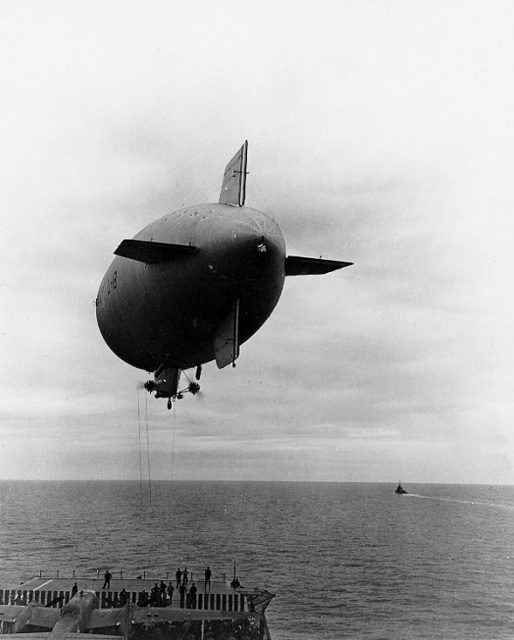 The U.S. Navy blimp L-8 over the aircraft carrier USS Hornet (CV-8) at the beginning of the “Doolittle Raid” in April 1942
