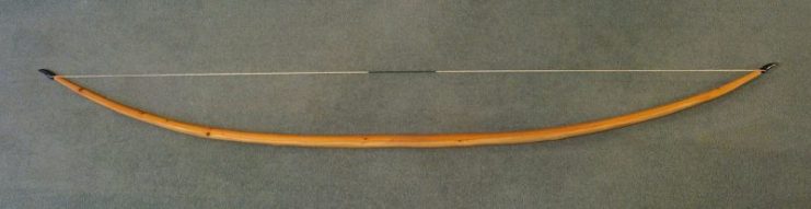 Self-yew English longbow, 6 ft 6 in (1.98 m) long, 470 N (105 lbf) draw force.