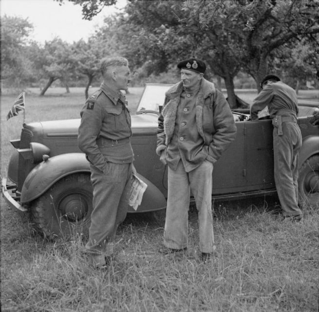 General Montgomery in conversation with Major General Douglas Graham, GOC 50th (Northumbrian) Infantry Division, pictured here in Normandy, 20 June 1944.