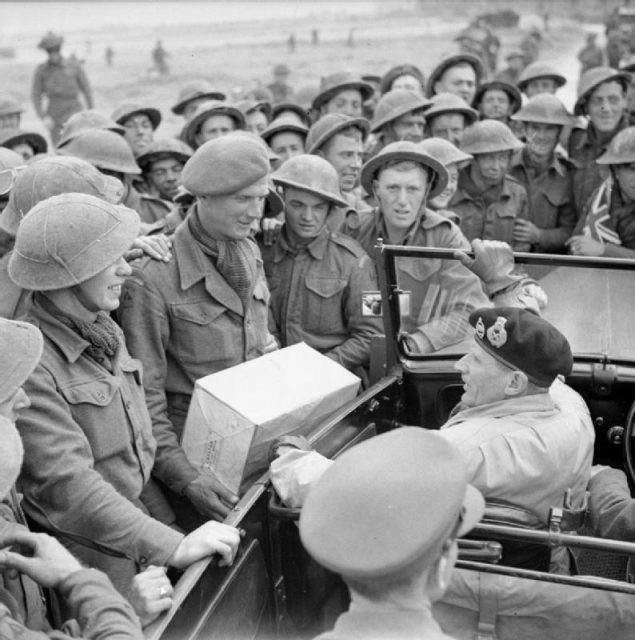 General Montgomery stops his car to chat to troops during a tour of I Corps area near Caen, 11 July 1944.
