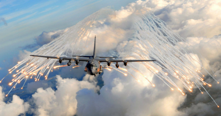 AC-130U Spooky Gunship from the 4th Special Operations Squadron jettisons flares over an area near Hurlburt Field, Florida