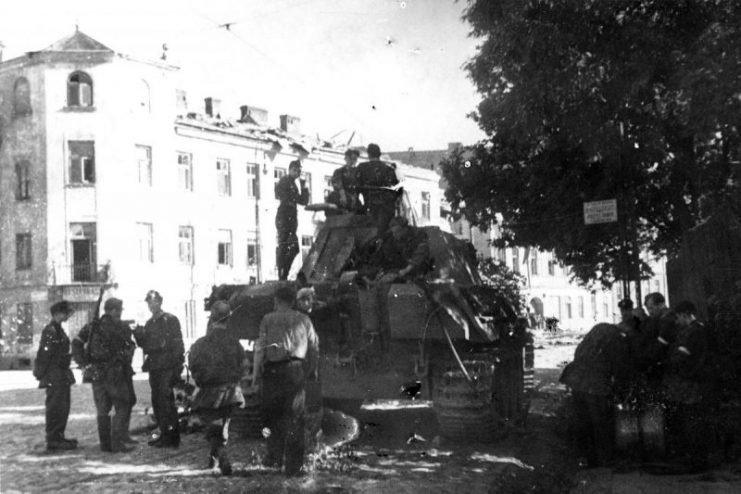 WarsawUprising: Soldiers of tank platoon “Wacek” of “”Zośka” Battalion on a German Panther tank.