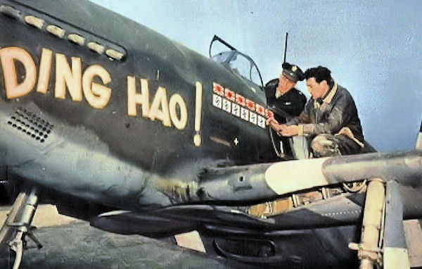 North American P-51B-5 Mustang (serial 43-6315) Ding Hao!, flown by Major James H. Howard (in the cockpit), commander of the 356th Fighter Squadron, March 1944. He would go on to be awarded the Medal of Honor, June 1944.