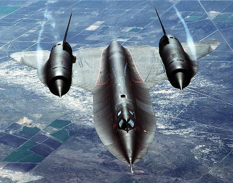 An air-to-air overhead front view of an SR-71A strategic reconnaissance aircraft. The SR-71, unofficially known as the “Blackbird,” is a long-range, advanced, strategic reconnaissance aircraft developed from the Lockheed A-12 Oxcart and YF-12A aircraft.