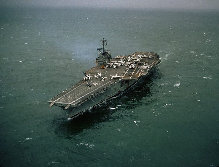 The U.S. Navy aircraft carrier USS Forrestal (CVA-59) underway off the Philippines on 12 August 1967. This photo was taken approximately three weeks after fires and explosions damaged the ship off Vietnam on 29 July 1967.