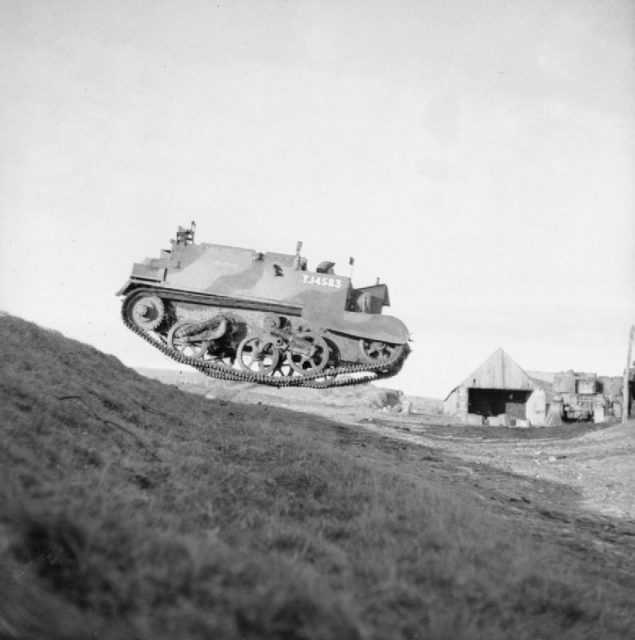 A Universal Carrier of 52nd Reconnaissance Regiment catches air on manoeuvres, Scotland, 10 November 1942