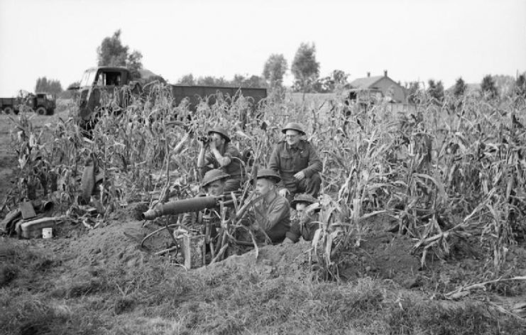 A Vickers machine-gun team of 7th Royal Northumberland Fusiliers, 59th (Staffordshire) Division in position in a field of corn.