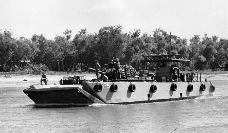 An LCU transports a 3rd Tank Battalion M48 up the Dong Ha River, 6 July 1967