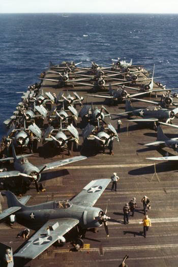 Grumman F4F-4 Wildcat of Fighting Squadron 71 (VF-71) and Douglas SBD-3 Dauntless aboard the U.S. Navy aircraft carrier USS Wasp (CV-7), in 1942.