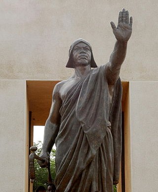 Statue of king of Dahomey, Behanzin. Photo: Dominik Schwarz / CC BY-SA 3.0