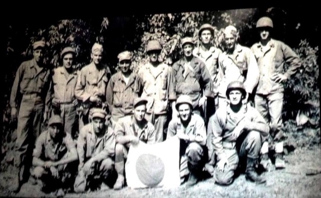 Captain Stevens (standing on far right) and his men at the Battle of Okinawa. (Photo credit: John Stevens)