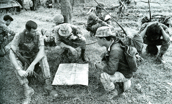 Captain John Ripley ( left ) Advisor to the 3th Vietnamese Marine Battalion and Major Le Ba Binh next right-battalion commander.