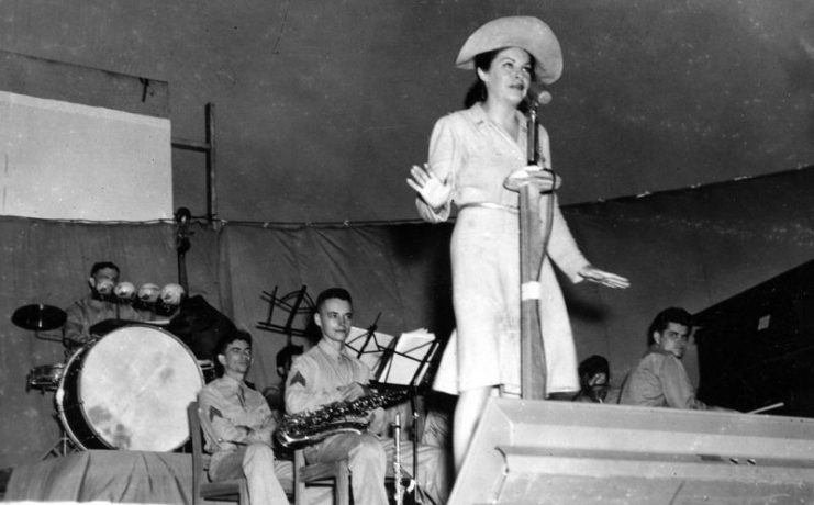 Martha Raye entertaining troops. Probably North Africa, c. 1943
