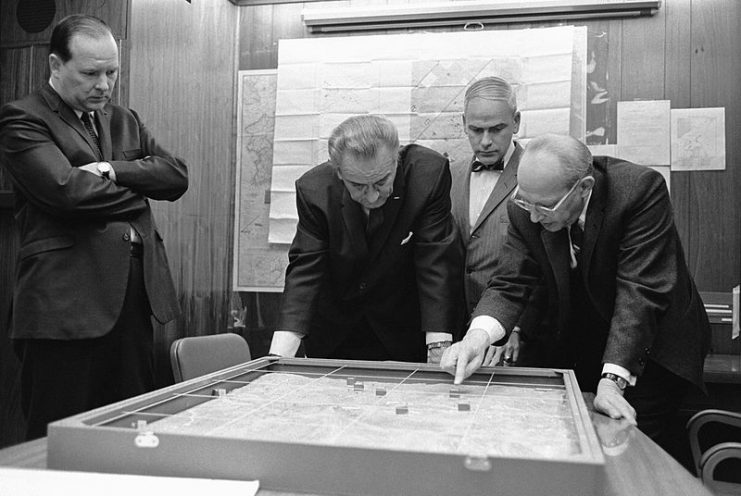 National Security Advisor Walt W. Rostow showing President Lyndon B. Johnson a model of the Khe Sanh area, 15 February 1968