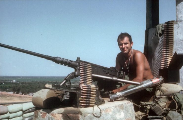 Prelude to Tet Offensive, January 27, 1968. 1st Cav LRP manning an M2.50 on top of LZ Betty’s water tower. Photo: Icemanwcs CC BY-SA 3.0