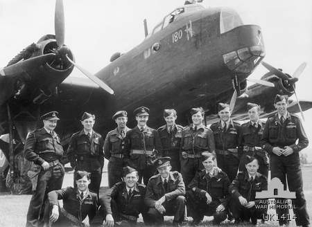 Australian members of No. 196 Squadron RAF with one of the unit’s Stirling aircraft in the background. This squadron towed gliders to Normandy on D-Day.