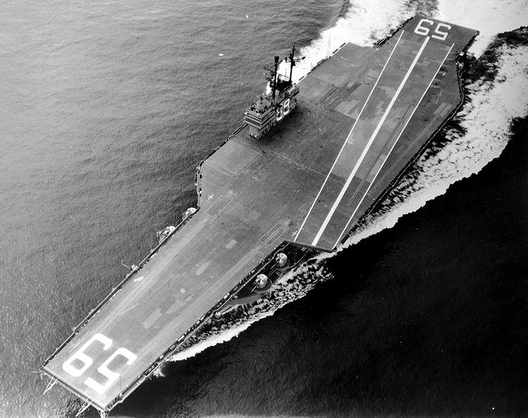 USS Forrestal (CV-59) underway on trials, 29 September 1955, just prior to commissioning.