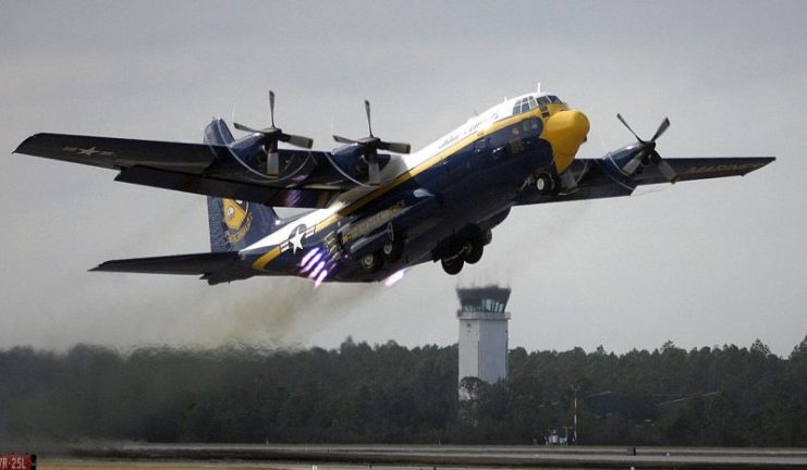 The U.S. Marine Corps C-130 Hercules, “Fat Albert,” assigned to the U.S. Navy “Blue Angels” flight demonstration team, uses Jet Assisted Take Off (JATO) bottles.