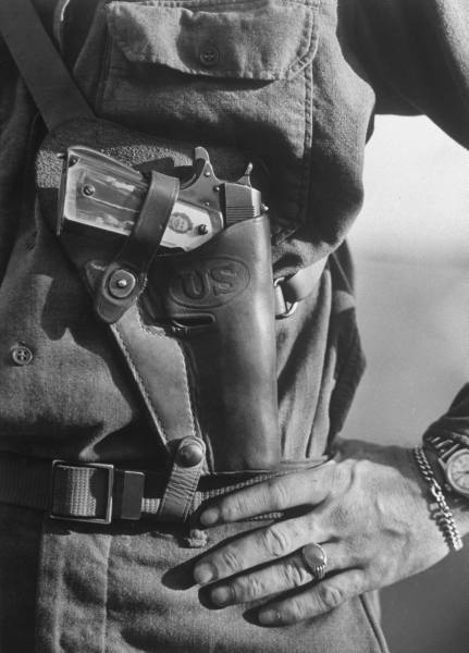 1911 Closeup of pistol handle w. photo of girlfriend of Lt. John Ernser, 26, leader of the US infantry engaged in attacks of German fortification positions at the Italian front