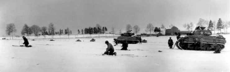 44th Armored Infantry soldiers and 6th Armored Division tanks near Bastogne, 31 December 1944