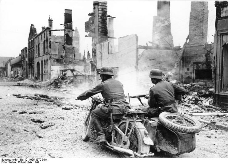 German soldiers on a motorcycle. By Bundesarchiv – CC BY-SA 3.0 de