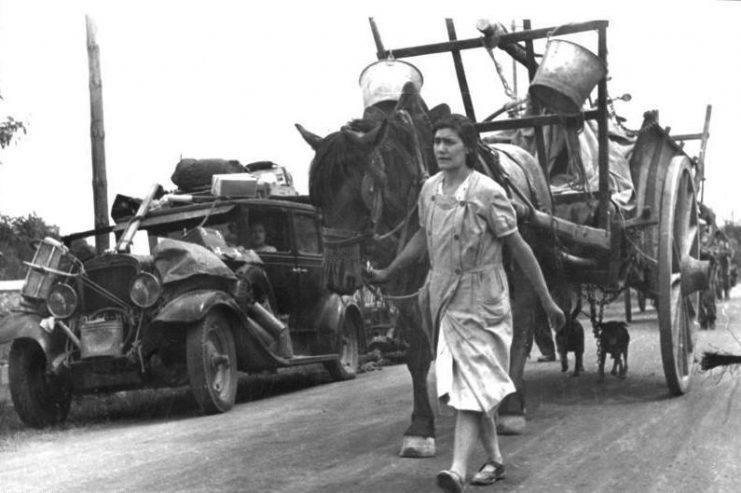 War refugees on a French road. By Bundesarchiv – CC BY-SA 3.0 de
