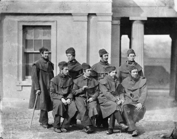 A group of Scots Fusilier Guards convalescing from wounds received in the Crimea at the Guards Barracks in London. Left to right: Private G. Biddlescombe Private Francis Trainer Private George Watt Private William Jay Private Edward Little Private J.F. Lilley Private William McPherson Private James Morgans