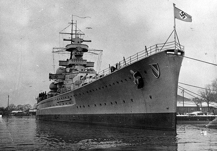 German battleship Scharnhorst in harbor when first completed. Note ship’s badge mounted on her bow, and snowy conditions at right.