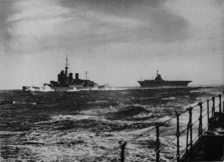 HMS Renown and HMS Ark Royal operating at sea in Force H. Photo taken from HMS Sheffield.