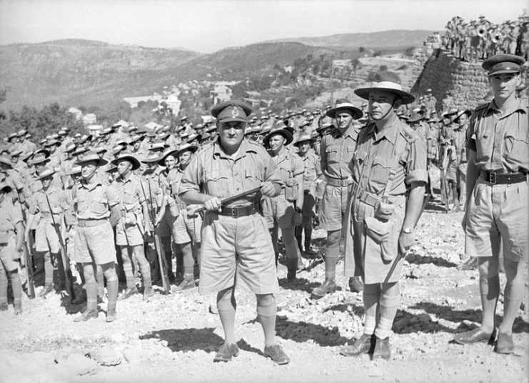 Hammana, Lebanon. Major General A. S. “Tubby” Allen, commander of the Australian 7th Division, with Lt Colonel Murray Moten, commander of the 2/27th Infantry Battalion and his men.