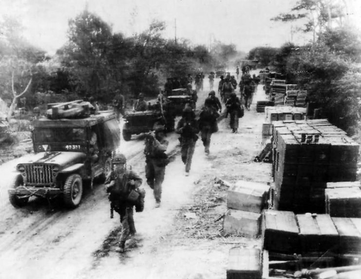 Marines and Jeeps Advance to Front Lines in Saipan.
