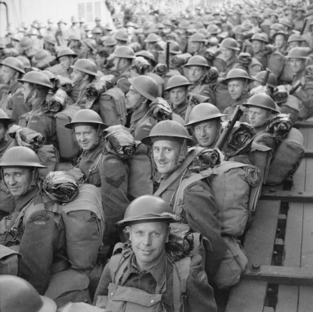 Men of the 3rd Canadian Division are carried ashore on a tender, having disembarked from a troopship at Gourock in Scotland.