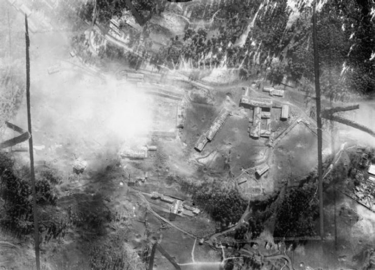 Aerial photograph taken during the daylight raid on Adolf Hitler’s chalet complex and the SS guard barracks at Obersalzberg near Berchtesgaden, Germany, by 359 Avro Lancasters and 16 De Havilland Mosquitos of Nos. 1, 5 and 8 Groups.