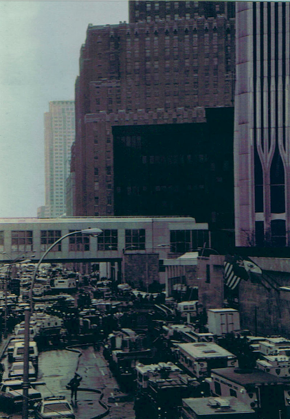 Procession of emergency vehicles at the World Trade Center bombing on February 26, 1993. The Tower is on the far right of the frame. Photo taken by Eric Ascalon from an adjacent pedestrian walkway. CC BY-SA 3.0