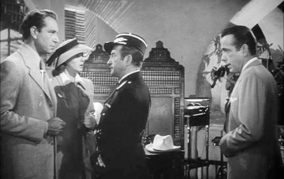 Screenshot of Paul Henreid, Ingrid Bergman, Claude Rains and Humphrey Bogart from the trailer for the film Casablanca.