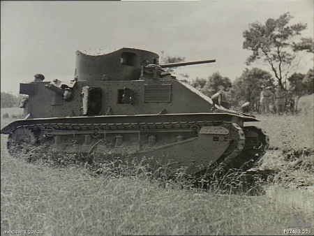 Side view of a Vickers Mark 2 Medium tank on manoeuvres. This tank weighs fifteen tons and is armed with a 47mm main gun and three .303 machine guns.