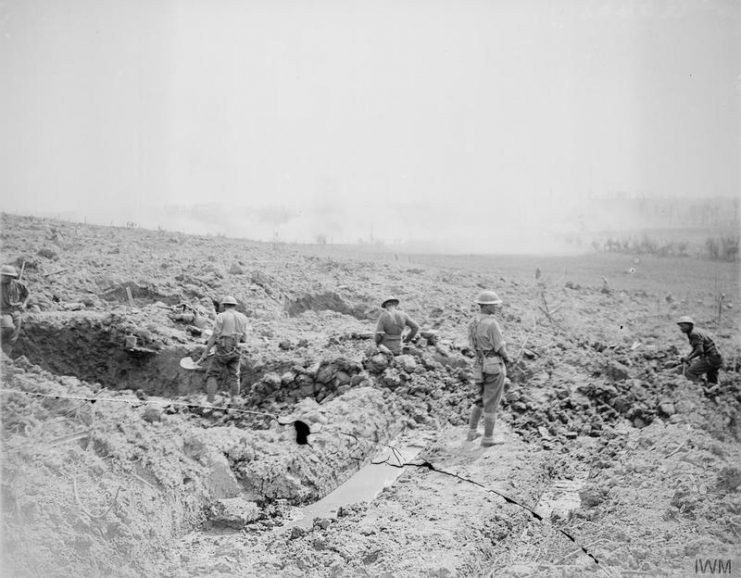 Shells bursting in a valley near Messines, June 7, 1917.
