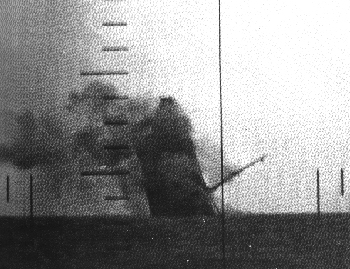 The Japanese freighter Nittsu Maru sinks by the bow after being torpedoed by Wahoo