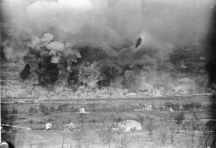 The town of Cassino shrouded in black smoke during the Allied barrage on March 15, 1944. Over 1,250 tons of bombs were dropped on this occasion.