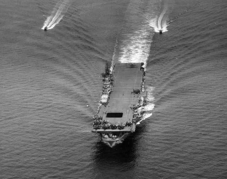 Aircraft carrier USS Ticonderoga underway recovering aircraft on 30 June 1944