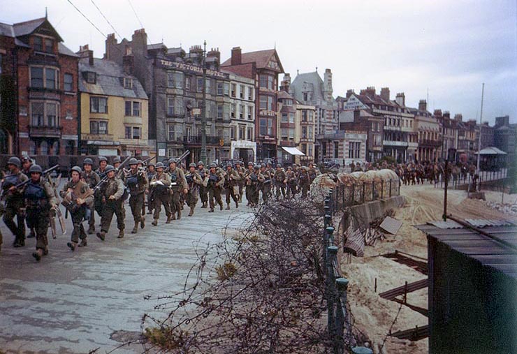 Rangers march through Weymouth, Dorset en route to board landing ships for the invasion of France.