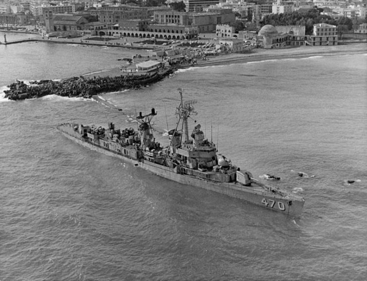 The U.S. Navy destroyer USS Bache (DD-470) aground just outside the harbour of Rhodes, Greece, circa February 1968. Note the many spectators ashore. Bache was blown ashore by gale force winds on 6 February 1968. There were no personnel casualties, but the ship was damaged beyond economical repair.