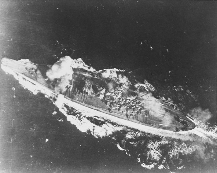 Yamato hit by a bomb near her forward gun turret in the Sibuyan Sea, October 24, 1944.