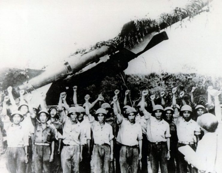 North Vietnamese SAM crew in front of SA-2 launcher.