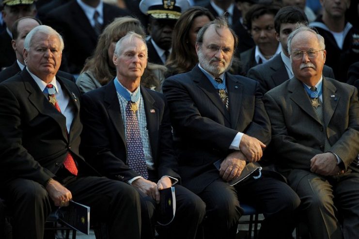 Medal of Honor recipient Thomas Norris second from left.