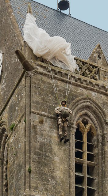 US Paratrooper, 82nd Airborne, June 6th, 1944, bell tower of church of Sainte-Mère-Église, Manche, Normandy, France.