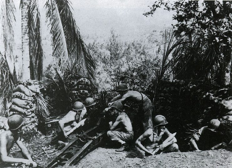 A U.S. 11th Marines 75mm pack howitzer and crew on Guadalcanal in September or October 1942. The lean condition of the crewmembers indicates that they haven’t been getting enough nutrition during this period.