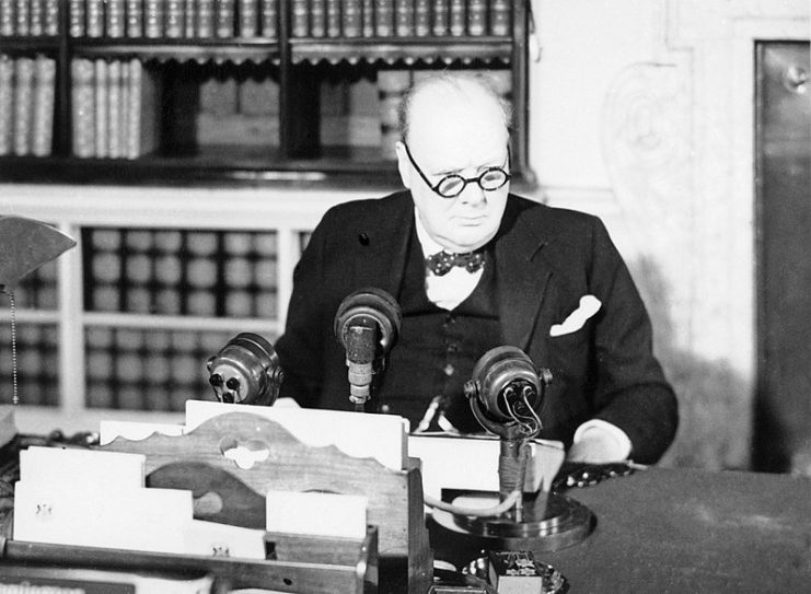 Winston Churchill at a BBC microphone about to broadcast to the nation on the afternoon of VE day